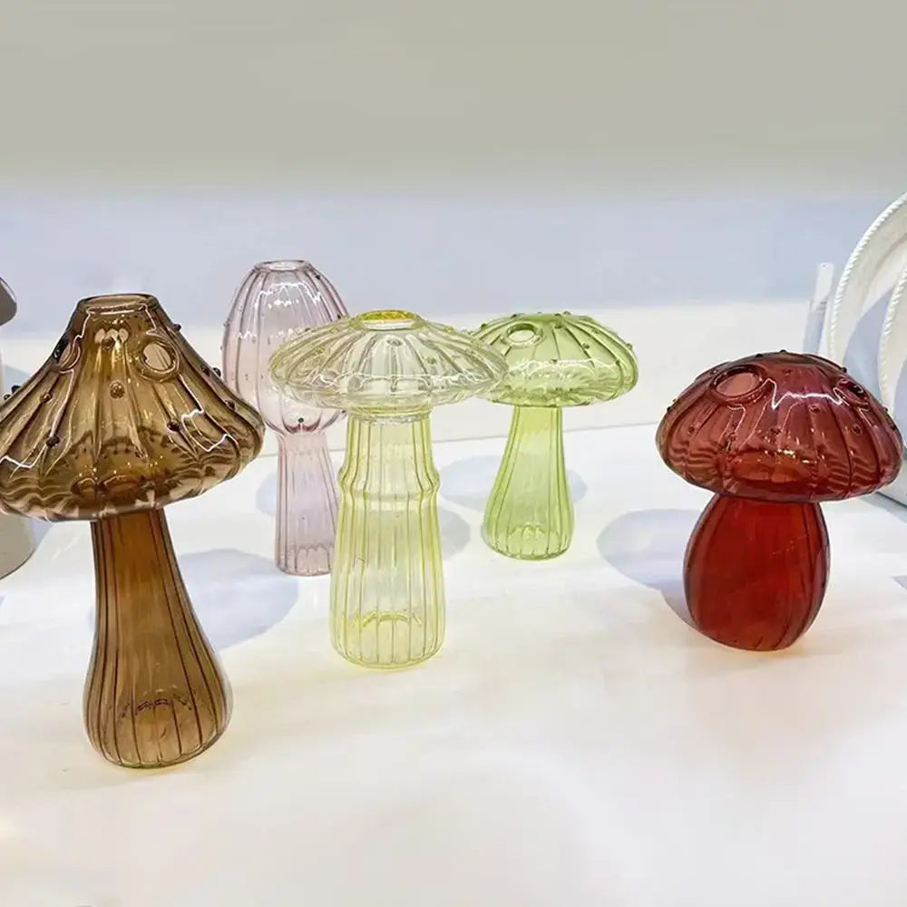 A collection of colorful translucent glass aromatherapy vases in amber lavender green and red for home decor