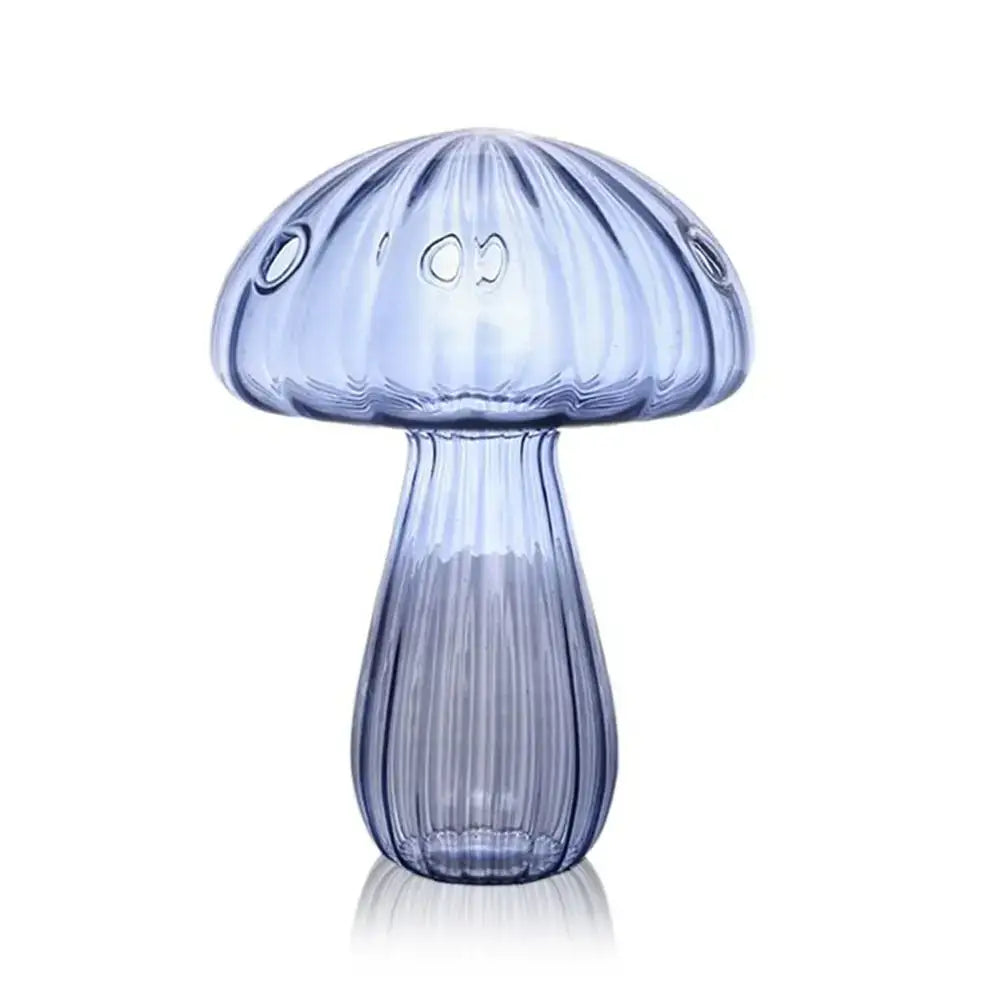 DecorBites™ translucent blue glass aromatherapy vase with vertical ridges and circular cutouts for home decor