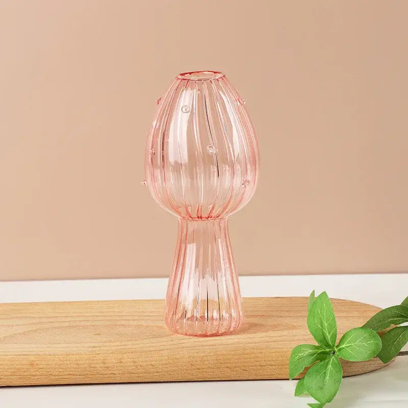 DecorBites™ glass aromatherapy vase in translucent pink with mushroom shape and spherical embellishments for home decor