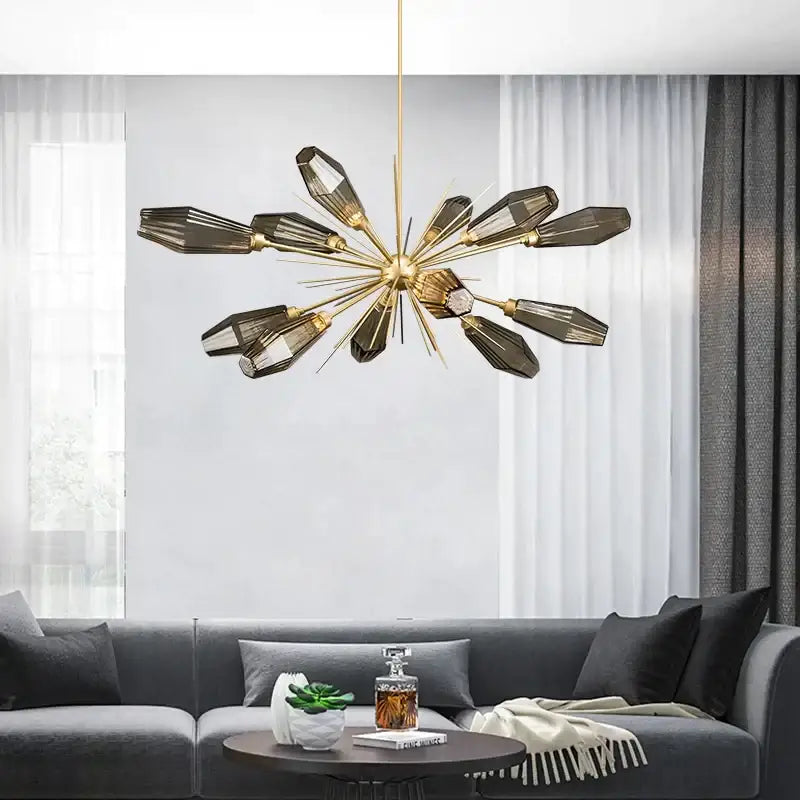 Gold-toned decorbites glass art chandelier with faceted dark glass arms for modern minimalist living room and bedroom decor
