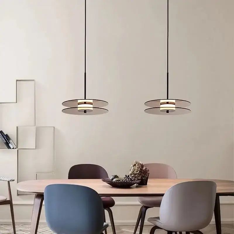 DecorBites glass art chandelier with sleek black cords and layered glass shades emitting warm LED light for modern spaces