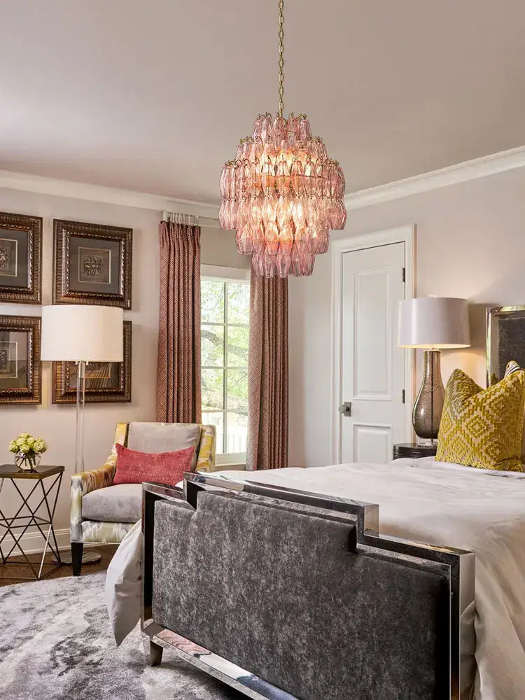 A delicate pink decorbites glass art led chandelier with cascading tiered design for living room lighting
