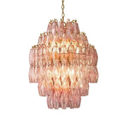 A tiered decorbites glass art led chandelier with faceted pink glass shades and gold-toned metal for living room