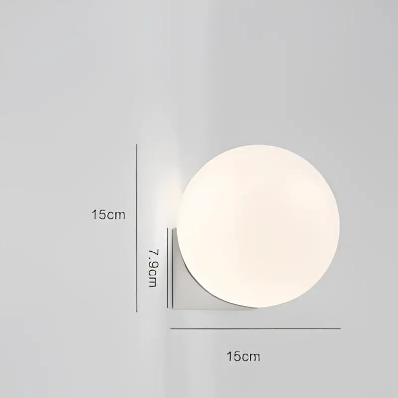 A sleek decorbites glass ball wall lamp with frosted white glass shade and slim metallic base for bedroom aisle lighting