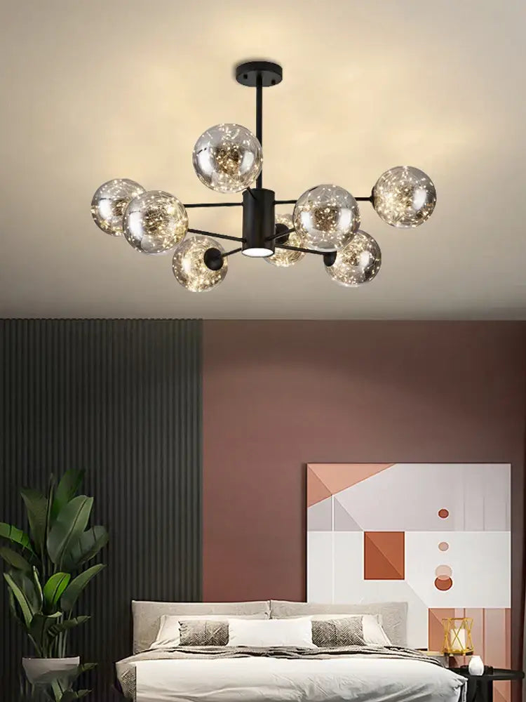 Modern black metal decorbites glass ball branch chandelier with multiple clear glass globe bulbs for living room lighting