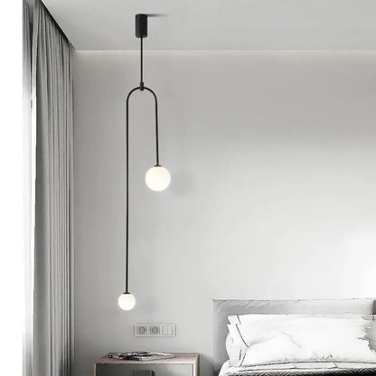 Black minimalist decorbites glass ball brass pendant lights featuring two frosted glass bulbs for restaurant and bedroom lighting