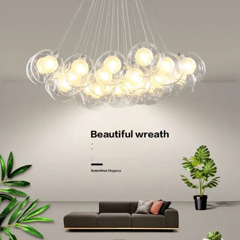 Modern glass bubble chandelier with warm glowing bulbs suspended by thin cords decorbites bubble chandelier