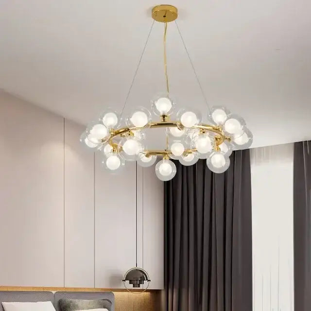 Decorbites glass ball gold-toned ball ceiling chandelier with clear glass globe bulbs for dining and living room decor