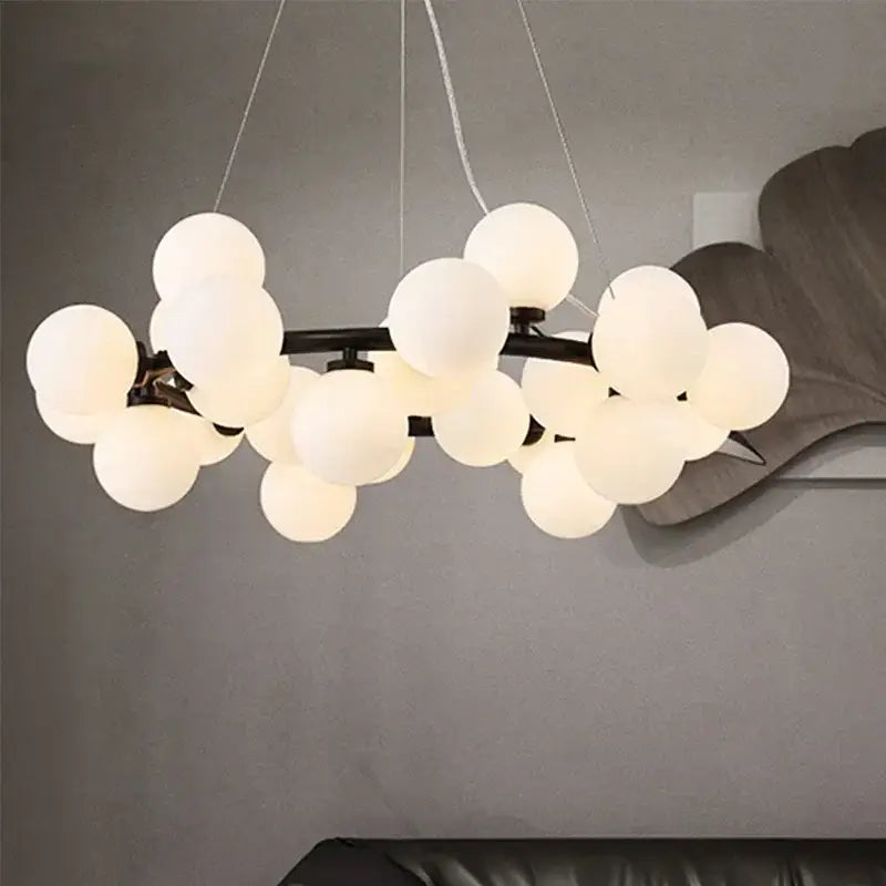 Modern decorbites glass ball ceiling chandelier with black metal frame and frosted white glass globe bulbs for dining room