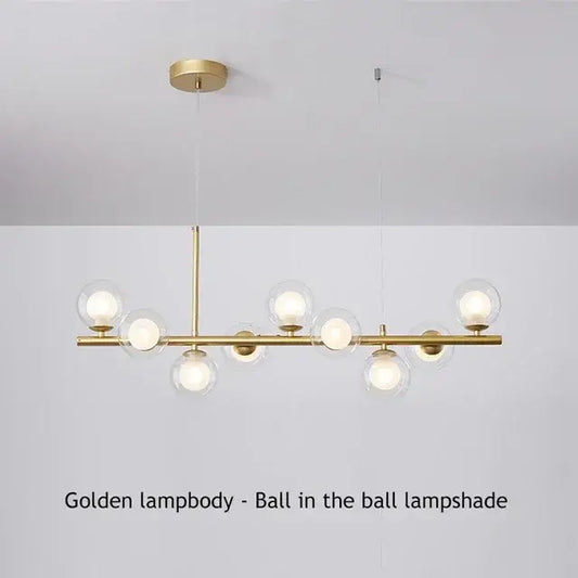 Golden DecorBites™ glass ball ceiling chandelier with spherical glass shades housing illuminated bulbs for home decor