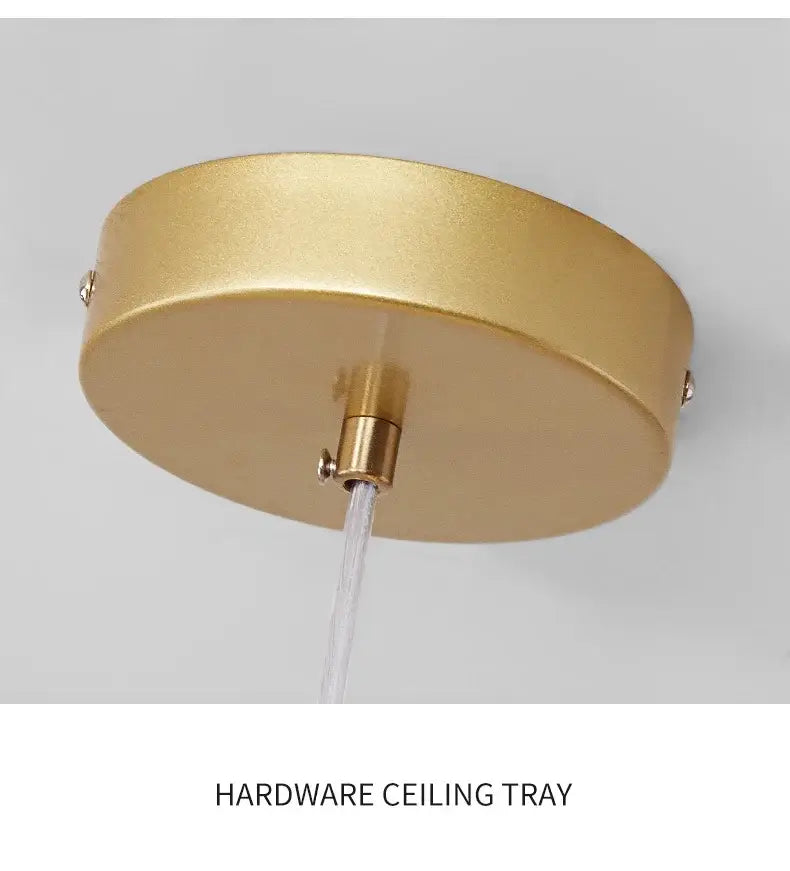Gold-colored circular ceiling tray with brushed metallic finish and central mounting for decorbites ball ceiling chandelier
