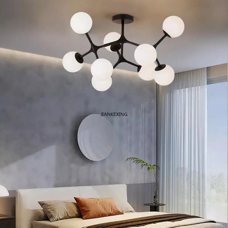 Modern black metal DecorBites glass ball ceiling chandelier with multiple white spherical glass globes for living room