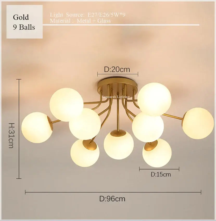 Gold-toned DecorBites glass ball ceiling chandelier with nine frosted glass spheres in a modern branching design