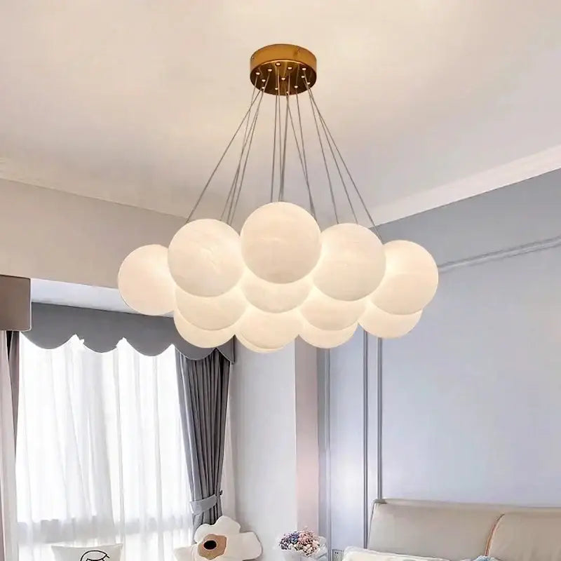 DecorBites glass ball pendant lights featuring frosted glass spheres and brass finish for elegant home decor lighting