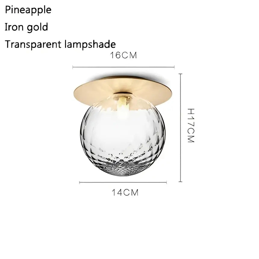 Gold-toned pineapple ceiling lamp with transparent faceted glass ball ceiling shade by DecorBites glass ball