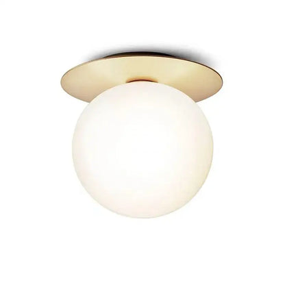 A decorbites glass ball ceiling light with a matte white glass globe and polished brass base for bedroom hallway stairs