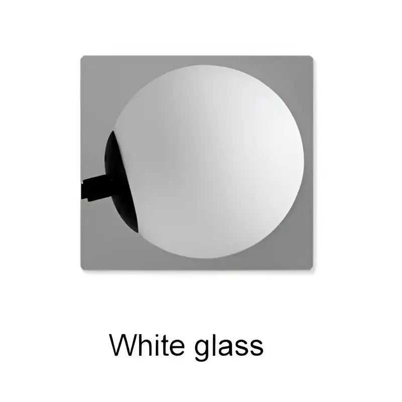 White glass globe lamp with sleek black stem in decorbites glass ball chandelier for dining room lighting
