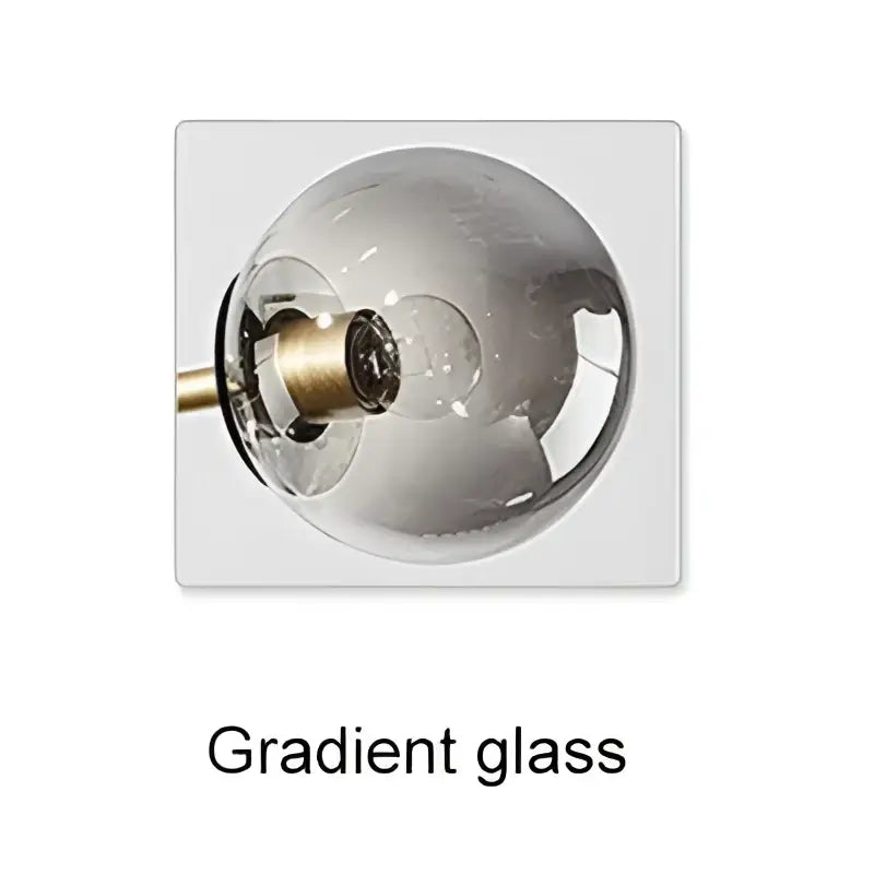 DecorBites glass ball chandelier with a smoky gray spherical glass lampshade and brass fixture for dining room lighting