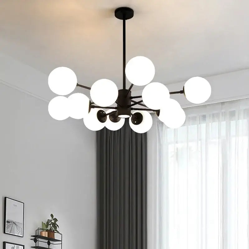 Modern black metal decorbites glass ball chandelier with multiple frosted glass globes for home dining room lighting