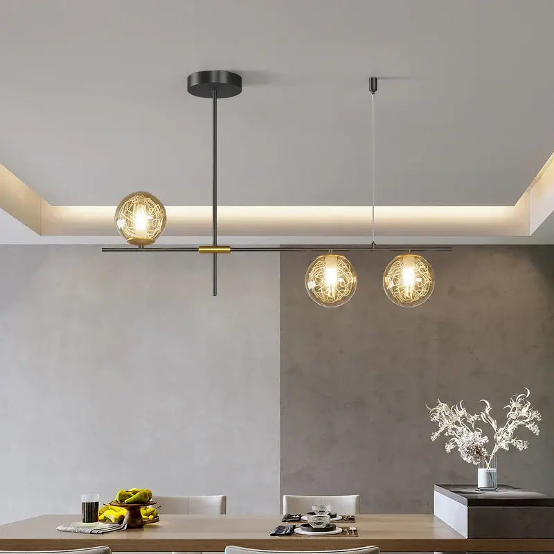 Modern minimalist decorbites glass ball chandelier with three spherical glass bulbs and gold-toned hardware ceiling light