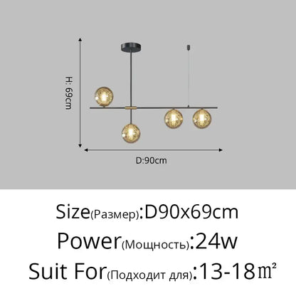 Modern minimalist DecorBites glass ball chandelier with four warm glass globes on black metal arms for ceiling lighting