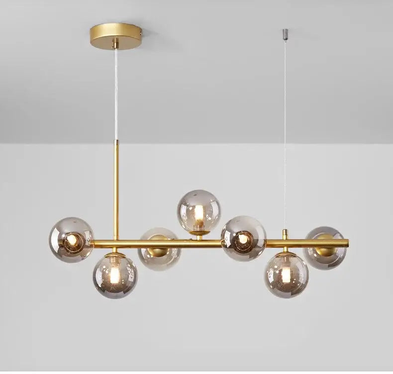 DecorBites™ glass ball chandelier with gold-toned pendant lights and smoked glass spheres for dining room lighting