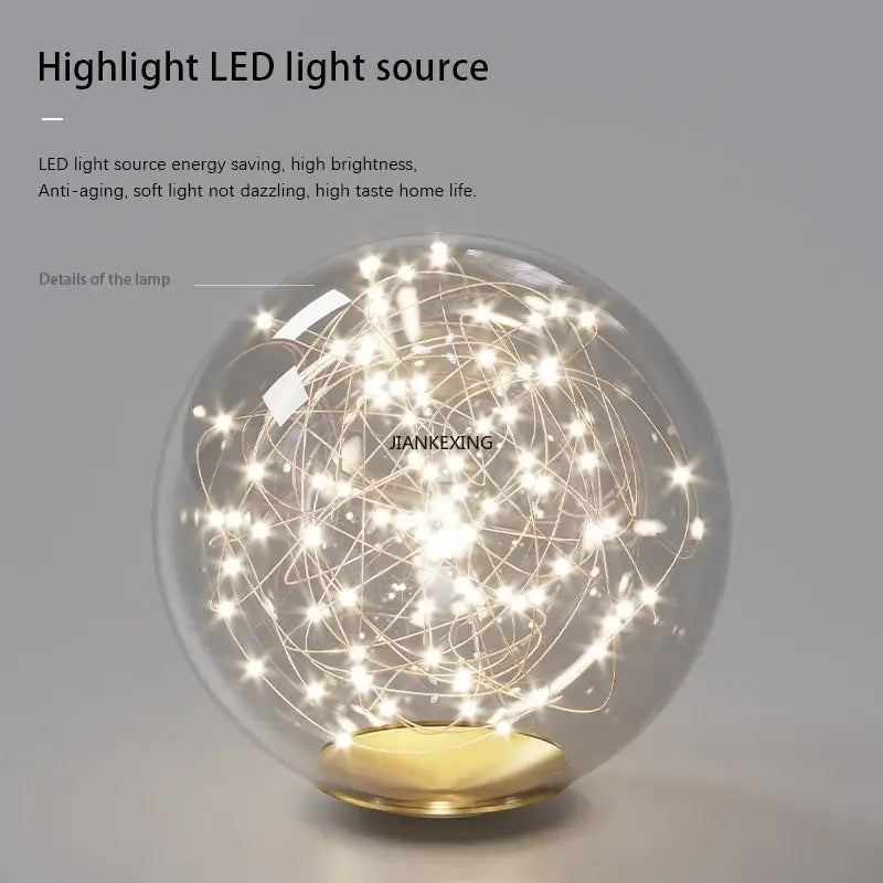 Decorbites glass ball chandelier featuring a clear spherical glass lamp with led fairy lights and gold-toned base for dining room