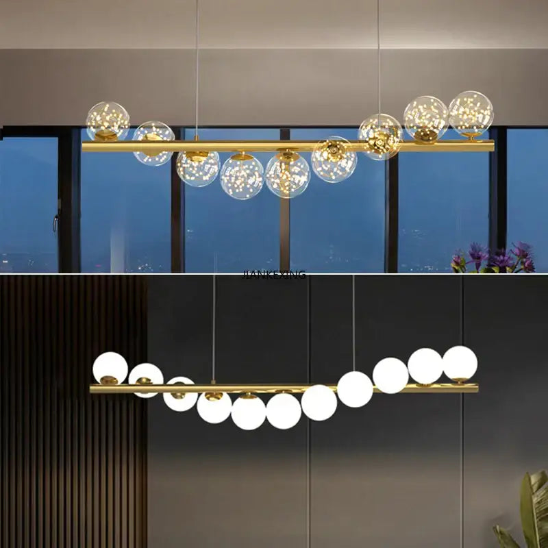 Gold-toned decorbites glass ball chandelier with clear glass globe bulbs and frosted white spherical shades for dining room