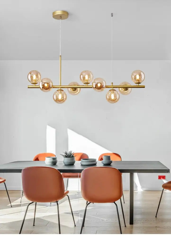 Decorbites™ glass ball chandelier with gold-toned brass rod and amber glass globe bulbs for home lighting