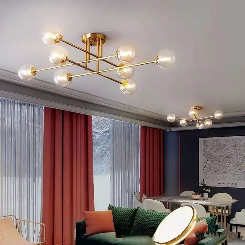 Gold-toned DecorBites glass ball chandelier with clear glass globe bulbs for living room bedroom and study lighting