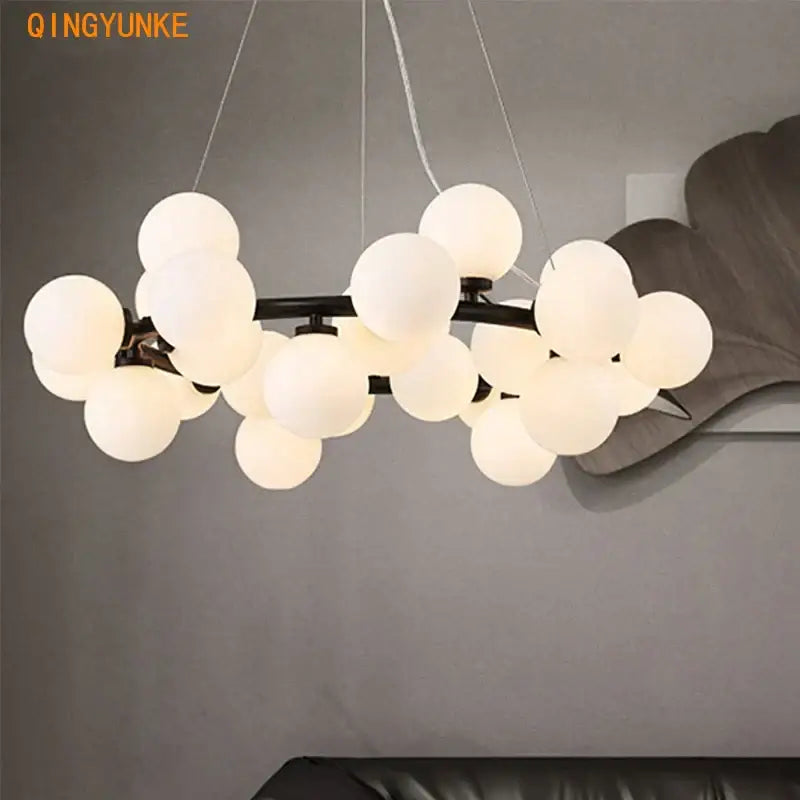 Modern nordic decorbites glass ball chandelier with frosted white glass globes and dark metal frame for living room lighting