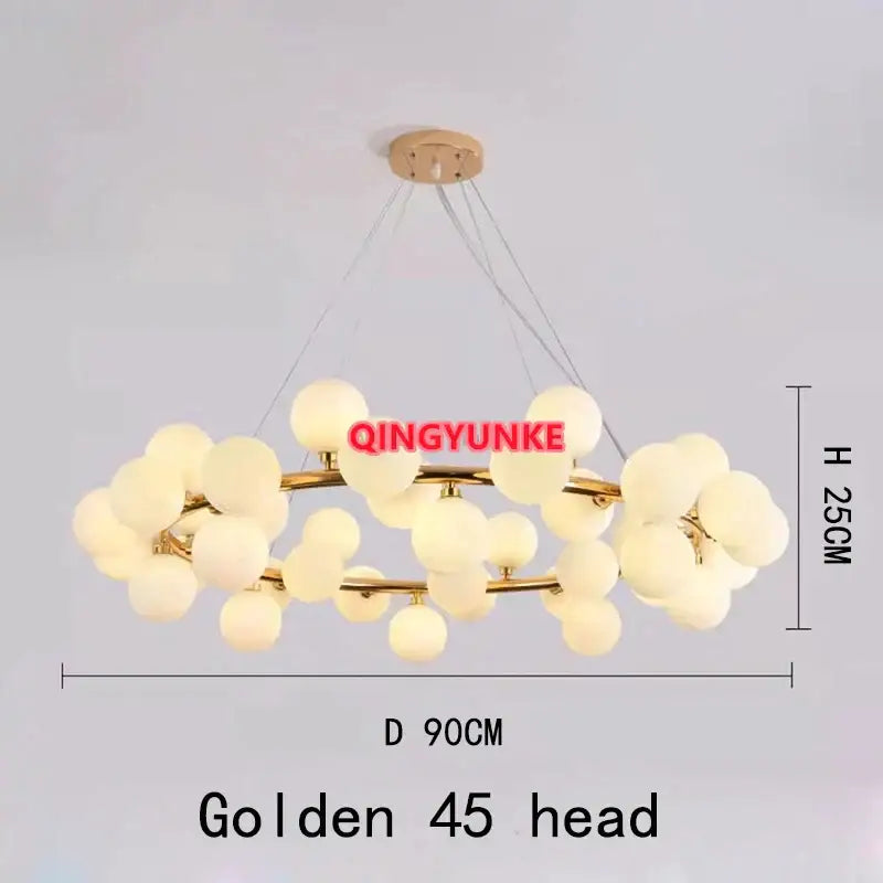 Golden 45-head DecorBites glass ball chandelier with frosted glass globes and brass metal arms for living room lighting