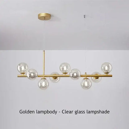 DecorBites™ glass ball chandelier with clear glass globe shades and a sleek brass frame for modern home lighting