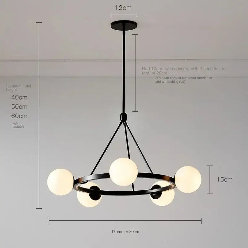 Black metal DecorBites glass ball chandelier with six frosted glass globes in a circular pendant light design