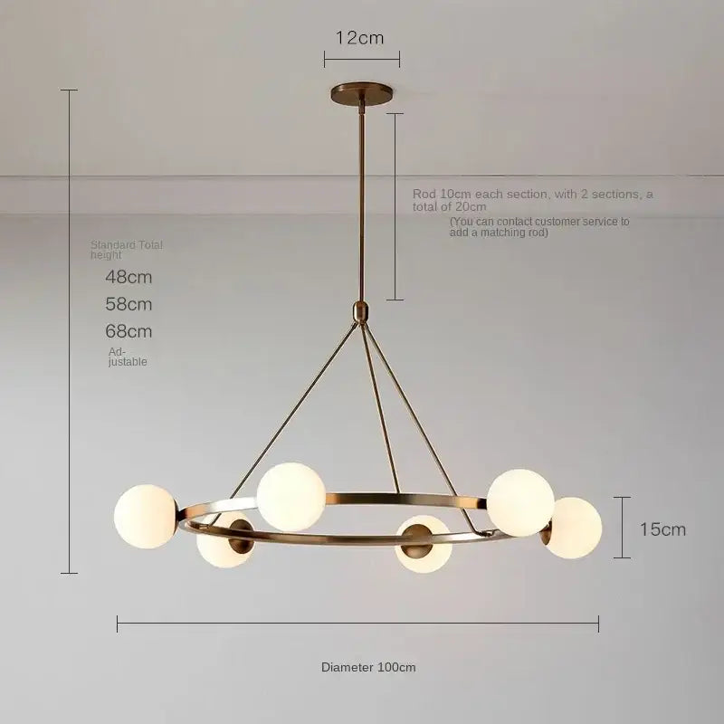 Modern brass-toned decorbites glass ball chandelier pendant light with circular frame and six frosted glass globes