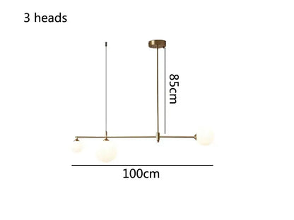 Modern brass-finished decorbites glass ball pendant light fixture with three spherical frosted glass shades for dining room