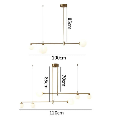Modern brass-toned decorbites glass ball pendant light fixture with frosted glass globe bulbs for dining room use