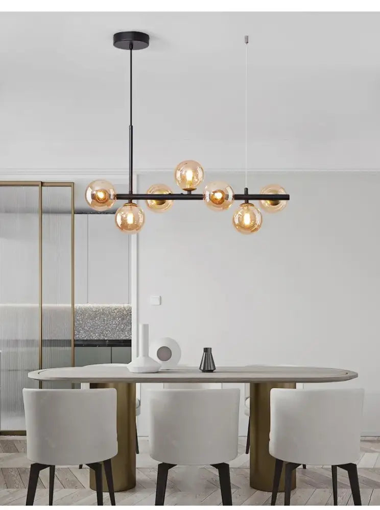 Modern black metal decorbites glass ball chandelier with warm amber globe bulbs lighting fixture for ceiling use