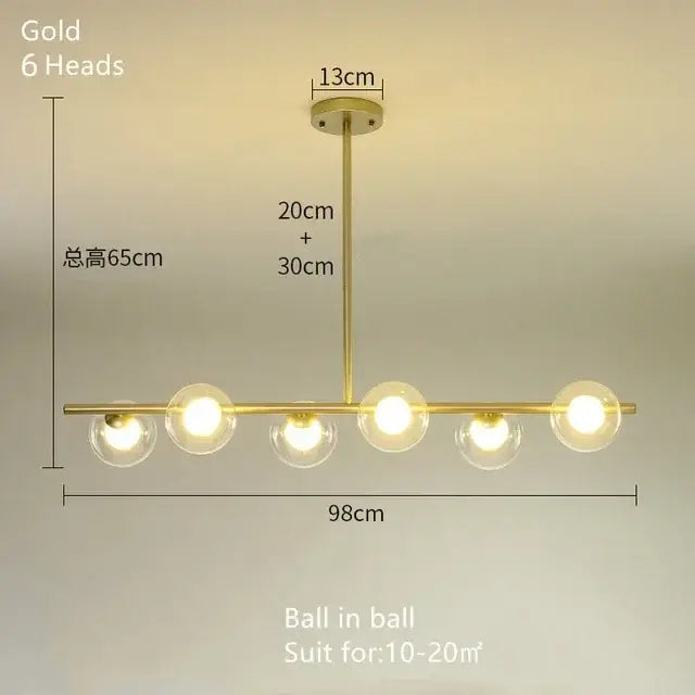 Gold-finished DecorBites glass ball chandelier with six spherical glass globes in a modern LED pendant lamp design