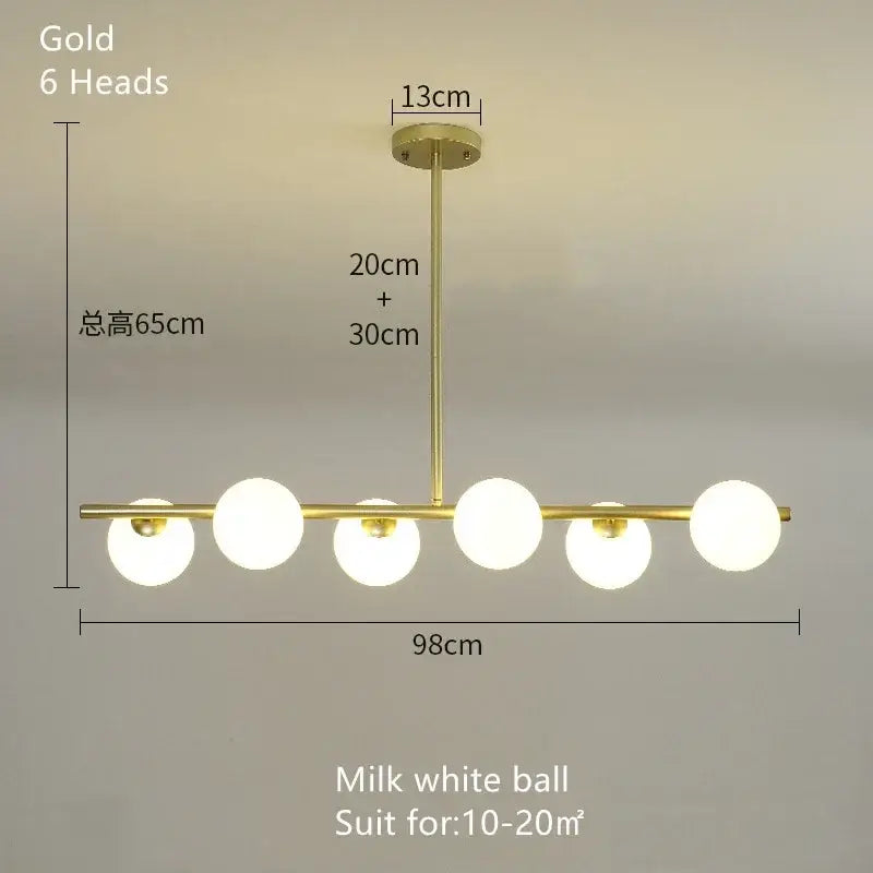Decorbites glass ball chandelier featuring six milk white spherical glass bulbs in a modern gold pendant design