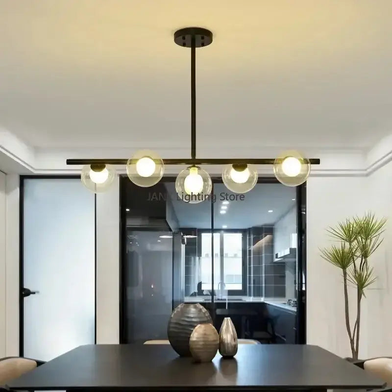Modern black metal decorbites glass ball chandelier with five clear glass globe bulbs for home decor lighting