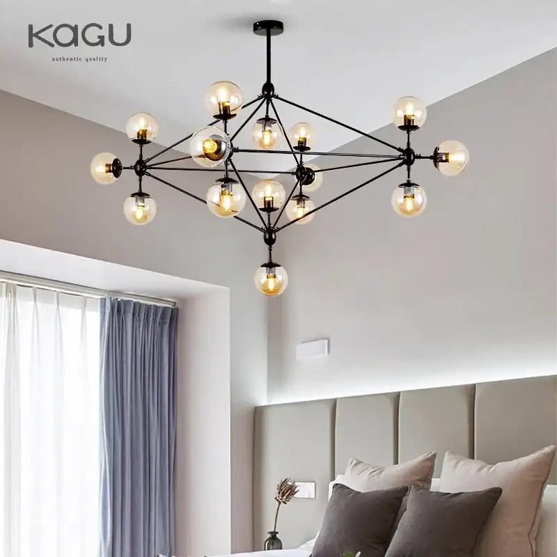 Black metal decorbites glass ball chandelier with multiple spherical glass bulbs in a modern minimalist geometric pattern