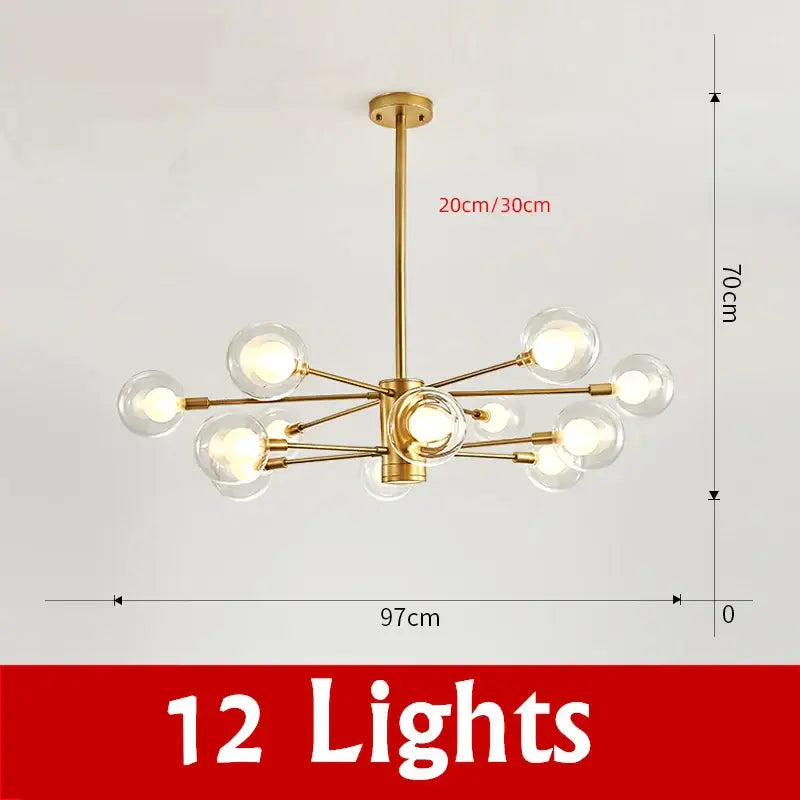 Gold-toned decorbites glass ball chandelier with twelve clear glass globe bulbs in modern radial design lighting fixture