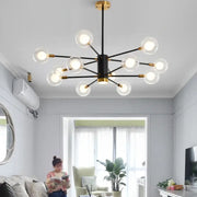 Modern black and gold decorbites glass ball chandelier with clear glass globe bulbs for elegant pendant lighting