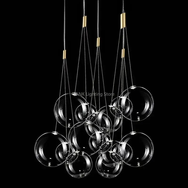 Modern decorbites glass ball chandelier with clear spherical bulbs and gold-toned metal accents for home decor