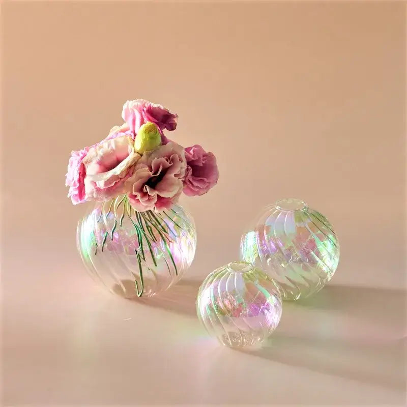 DecorBites™ glass ball vases set featuring iridescent spherical ribbed vases with pink flowers for elegant home decor