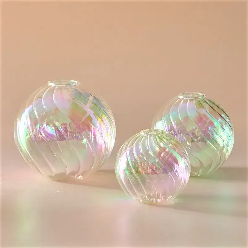 Set of three iridescent glass ball vases with swirling ribbed patterns perfect for elegant home decor vase set