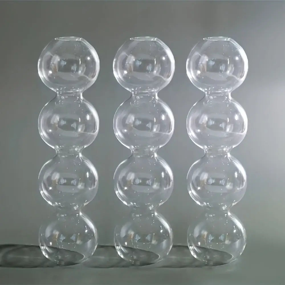 Three transparent glass bubble hydroponic vases composed of stacked spherical segments for wedding and home decor