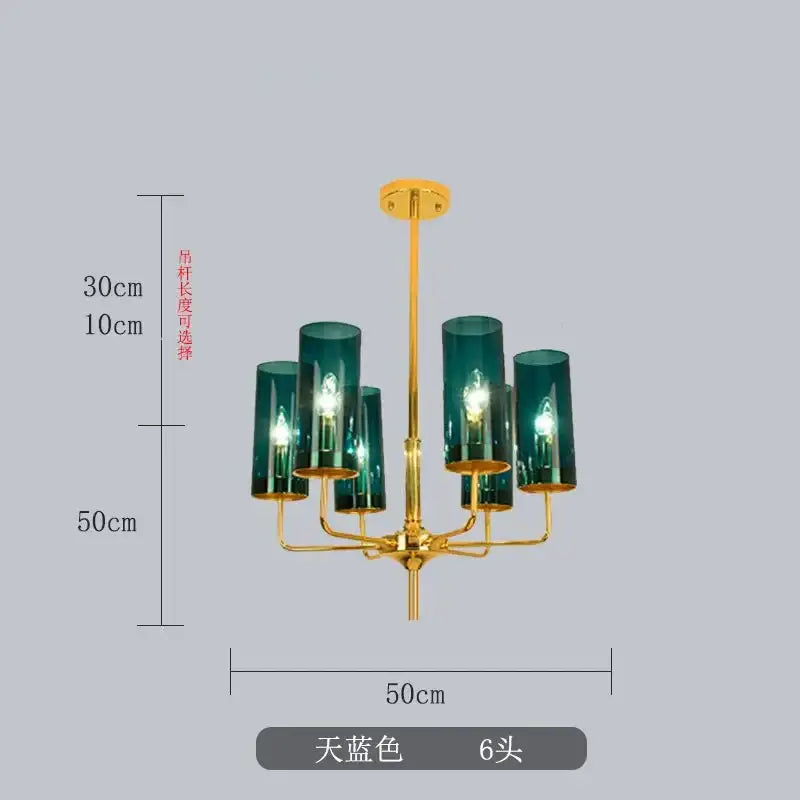 A decorbites glass chandelier with six teal glass shades and a gold finish for luxury dining room lighting