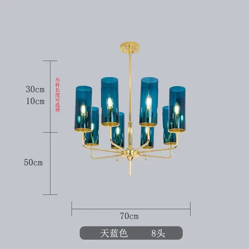 A decorbites glass chandelier with eight teal glass cylinders and a gold metal frame for luxury dining rooms